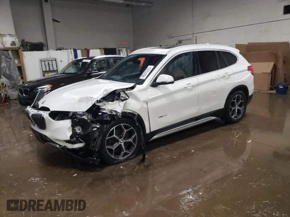 2016 BMW X1 xDrive28i with VIN WBXHT3C3XG5E51117, listed as a Copart auction lot 48243355 with 129,607 mi miles and Salvage Title. Bid and sale history available at carsss.com. Image 1.