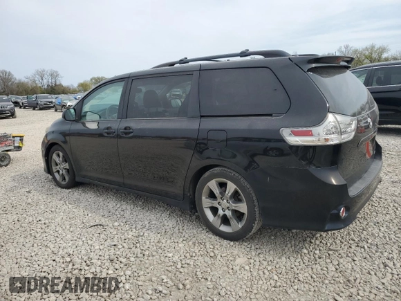 2012 Toyota Sienna SE with VIN 5TDXK3DC5CS255050, listed as a Copart auction lot 53136475 with 182,694 mi miles and Salvage title. Bid and sale history available at DreamBid. Image 2.