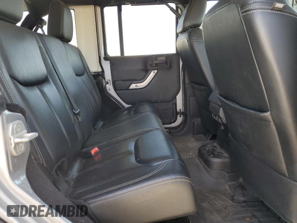 2013 Jeep Wrangler Unlimited Rubicon с VIN 1C4HJWFG3DL575477, выставлен на аукционе Copart как лот 63424765 с пробегом 133 085 миль миль и Чистый • Clean title. История ставок и продаж доступна на DreamBid. Изображение 11.