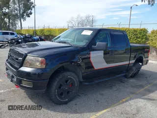 2004 Ford F-150 XLT with VIN 1FTPW14554KD15508, listed as a IAAI auction lot 41809154 with 184,790 mi miles. Bid and sale history available at carsss.com. Image 2.
