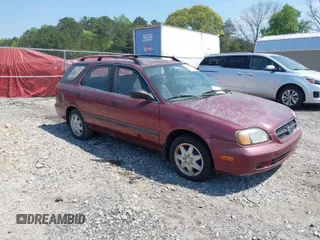1999 Suzuki Esteem GL with VIN JS2GB41W4X5160663, listed as a IAAI auction lot 42056553 with 91,057 mi miles and . Bid and sale history available at DreamBid. Image 1.