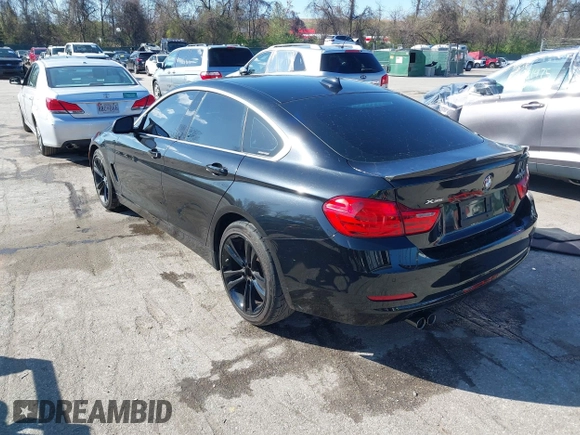 2016 BMW 4 Series 428i xDrive with VIN WBA4C9C53GG135945, listed as a IAAI auction lot 41964691 with 93,273 mi miles and . Bid and sale history available at carsss.com. Image 3.