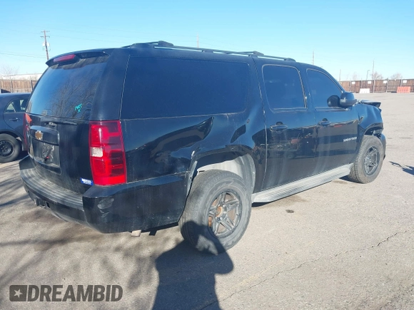 2013 Chevrolet Suburban LS with VIN 1GNSKHE76DR155667, listed as a IAAI auction lot 41053774 with 118,655 mi miles. Bid and sale history available at carsss.com. Image 4.