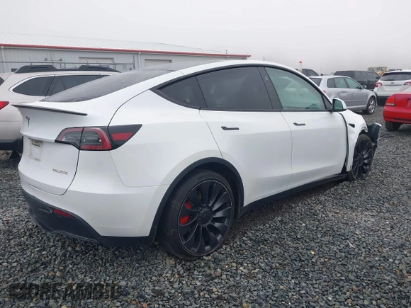 2023 Tesla Model Y Performance z VIN 7SAYGDEF2PF917295, wystawiony jako IAAI lot #41260852 z przebiegiem 23 295 mil mil oraz . Historia ofert i sprzedaży dostępna na DreamBid. Obrazek 4.