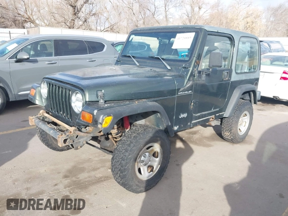 1998 Jeep Wrangler SE with VIN 1J4FY29P1WP760687, listed as a IAAI auction lot 41720889 with 210,592 mi miles. Bid and sale history available at carsss.com. Image 2.