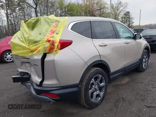 2018 Honda CR-V EX-L with VIN 5J6RW2H81JL025818, listed as a IAAI auction lot 42038457 with 102,579 mi miles. Bid and sale history available at carsss.com. Image 4.