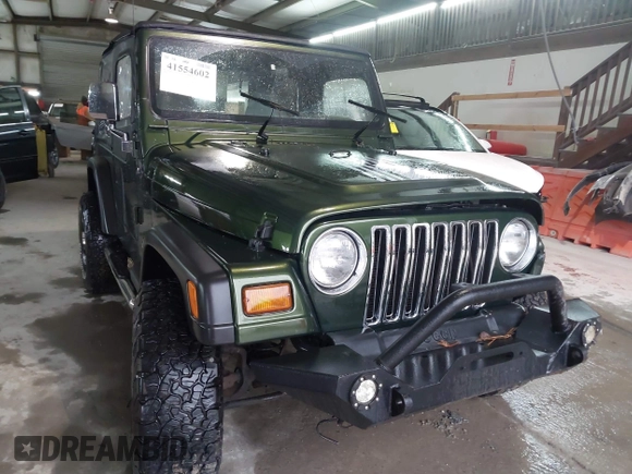 1998 Jeep Wrangler SE with VIN 1J4FY29P2WP733255, listed as a IAAI auction lot 41554602 with 157,316 mi miles. Bid and sale history available at carsss.com. Image 1.