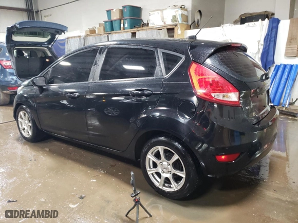 2012 Ford Fiesta SE with VIN 3FADP4EJ3CM132215, listed as a Copart auction lot 47667815 with 187,024 mi miles and Salvage Title. Bid and sale history available at carsss.com. Image 2.
