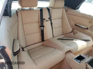 2005 BMW 3 Series 325Ci z VIN WBABW334X5PL38945, wystawiony jako Copart lot #57149565 z przebiegiem 184 975 mil mil oraz Szkoda całkowita • Salvage title. Historia ofert i sprzedaży dostępna na DreamBid. Obrazek 10.