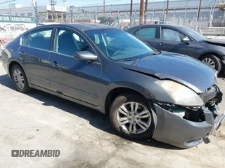 2009 Nissan Altima S z VIN 1N4AL21E99N441858, wystawiony jako IAAI lot #42323586 z przebiegiem 187 709 mil mil oraz . Historia ofert i sprzedaży dostępna na DreamBid. Obrazek 1.
