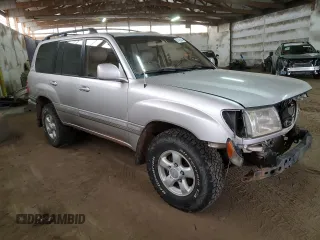 1999 Toyota Land Cruiser with VIN JT3HT05J1X0038590, listed as a Copart auction lot 87452404 with 232,244 mi miles and Salvage Title. Bid and sale history available at carsss.com. Image 4.