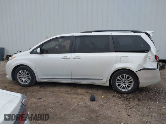 2016 Toyota Sienna XLE with VIN 5TDYK3DC2GS726677, listed as a IAAI auction lot 41609165 with 144,858 mi miles. Bid and sale history available at carsss.com. Image 14.