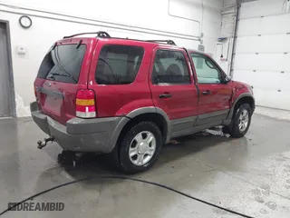 2001 Ford Escape XLT with VIN 1FMYU04121KA37255, listed as a IAAI auction lot 41526550 with 262,158 mi miles. Bid and sale history available at carsss.com. Image 4.