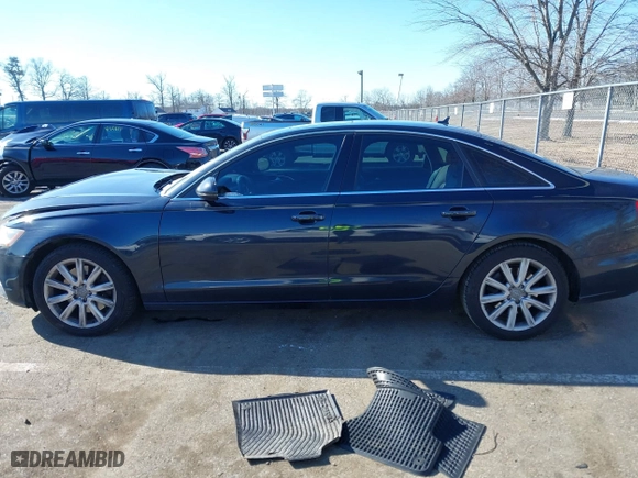 2014 Audi A6 2.0T Premium Plus with VIN WAUGFAFC4EN133050, listed as a IAAI auction lot 41625553 with 130,251 mi miles. Bid and sale history available at carsss.com. Image 14.