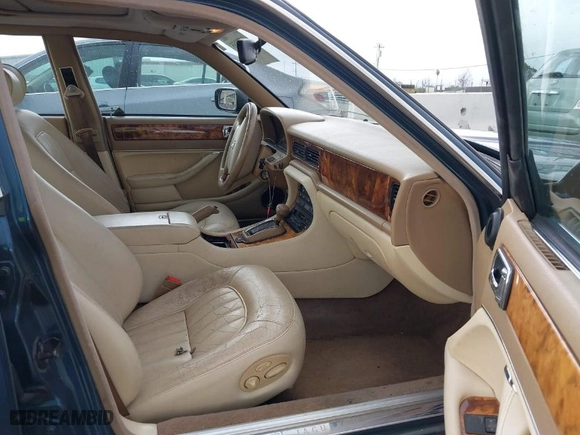 1996 Jaguar XJ Series Sedan with VIN SAJHX1743TC759842, listed as a IAAI auction lot 41778155 with NaN miles. Bid and sale history available at carsss.com. Image 5.
