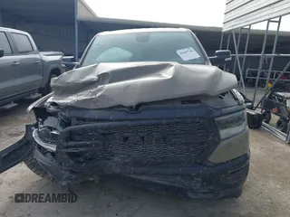 2020 Ram 1500 Big Horn with VIN 1C6SRFFT0LN301093, listed as a IAAI auction lot 41607746 with 65,223 mi miles and . Bid and sale history available at DreamBid. Image 12.