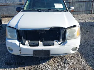 2005 GMC Envoy SLE with VIN 1GKDT13S052378542, listed as a IAAI auction lot 41897213 with 178,355 mi miles. Bid and sale history available at carsss.com. Image 6.