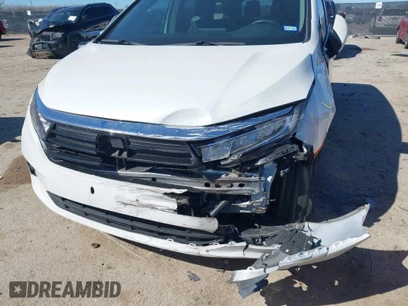 2023 Honda Odyssey Touring with VIN 5FNRL6H88PB003865, listed as a IAAI auction lot 41715384 with 40,765 mi miles and . Bid and sale history available at DreamBid. Image 6.