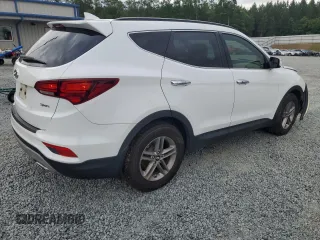 2018 Hyundai Santa Fe 2.4L z VIN 5NMZU3LB6JH104469, wystawiony jako Copart lot #57587495 z przebiegiem 78 267 mil mil oraz Szkoda całkowita • Salvage title. Historia ofert i sprzedaży dostępna na DreamBid. Obrazek 3.