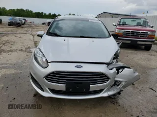 2016 Ford Fiesta SE z VIN 3FADP4BJXGM149197, wystawiony jako Copart lot #57100405 z przebiegiem 106 429 mil mil oraz Nie do naprawy • Non repairable. Historia ofert i sprzedaży dostępna na DreamBid. Obrazek 5.