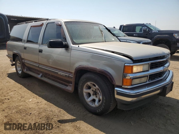 1999 Chevrolet Suburban with VIN 3GNEC16R2XG144591, listed as a Copart auction lot 65368364 with 244,605 mi miles and Non Repairable. Bid and sale history available at carsss.com. Image 4.