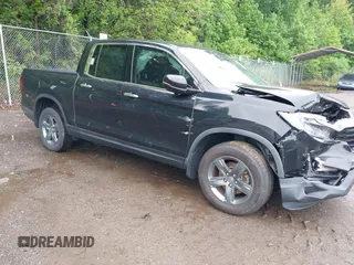 2021 Honda Ridgeline RTL-E with VIN 5FPYK3F75MB015370, listed as a IAAI auction lot 42253586 with 84,188 mi miles and . Bid and sale history available at DreamBid. Image 1.