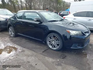 2011 Scion tC with VIN JTKJF5C74B3014552, listed as a IAAI auction lot 42004369 with 232,588 mi miles. Bid and sale history available at carsss.com. Image 1.