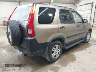 2004 Honda CR-V EX with VIN JHLRD78814C057877, listed as a IAAI auction lot 42065687 with 220,207 mi miles and . Bid and sale history available at carsss.com. Image 4.