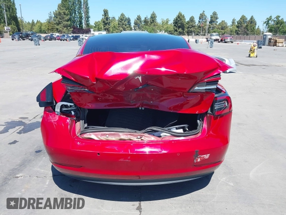 2018 Tesla Model 3 Long Range Battery z VIN 5YJ3E1EAXJF048839, wystawiony jako IAAI lot #42328412 z przebiegiem 83 083 mil mil oraz . Historia ofert i sprzedaży dostępna na DreamBid. Obrazek 16.