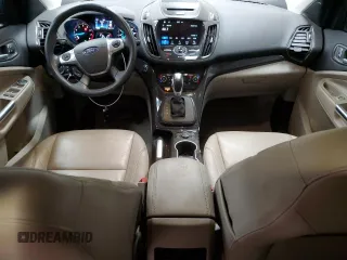 2016 Ford Escape Titanium with VIN 1FMCU9J95GUC57205, listed as a Copart auction lot 71033934 with 90,477 mi miles and Salvage Title. Bid and sale history available at DreamBid. Image 8.