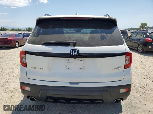 2021 Honda Passport Elite with VIN 5FNYF8H03MB007617, listed as a Copart auction lot 63036345 with 21,757 mi miles and Salvage title. Bid and sale history available at DreamBid. Image 6.