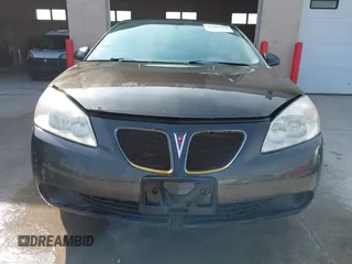 2007 Pontiac G6 1SV Value Leader with VIN 1G2ZF58B674177975, listed as a IAAI auction lot 41900661 with 188,500 mi miles and . Bid and sale history available at carsss.com. Image 6.
