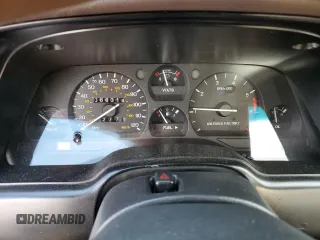 1994 Ford Thunderbird LX with VIN 1FALP62W6RH128762, listed as a Copart auction lot 84306604 with 68,314 mi miles and Salvage Title. Bid and sale history available at DreamBid. Image 9.