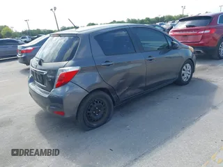 2012 Toyota Yaris L with VIN JTDKTUD38CD540219, listed as a IAAI auction lot 42091750 with 152,878 mi miles. Bid and sale history available at carsss.com. Image 4.