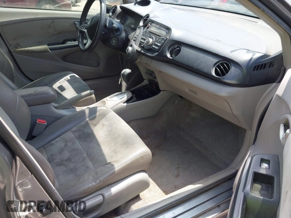 2013 Honda Insight EX with VIN JHMZE2H74DS002123, listed as a IAAI auction lot 42204860 with 279,376 mi miles and . Bid and sale history available at DreamBid. Image 5.