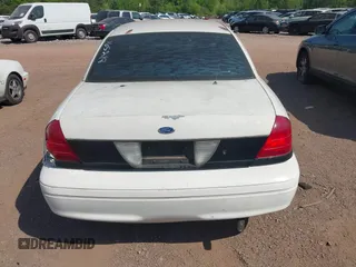 2001 Ford Crown Victoria Police Interceptor z VIN 2FAFP71W21X165218, wystawiony jako IAAI lot #42062199 z przebiegiem 233 978 mil mil oraz . Historia ofert i sprzedaży dostępna na DreamBid. Obrazek 16.