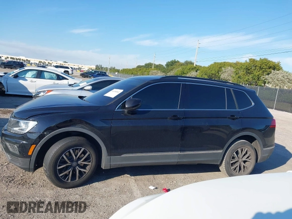 2020 Volkswagen Tiguan SE z VIN 3VV3B7AX1LM019574, wystawiony jako IAAI lot #41450002 z przebiegiem 44 553 mil mil oraz . Historia ofert i sprzedaży dostępna na DreamBid. Obrazek 14.