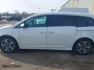 2015 Honda Odyssey Touring Elite with VIN 5FNRL5H9XFB121921, listed as a IAAI auction lot 41858551 with 61,506 mi miles. Bid and sale history available at carsss.com. Image 14.