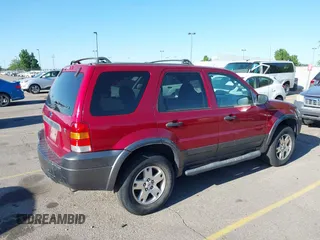 2006 Ford Escape XLT z VIN 1FMYU03156KB19294, wystawiony jako IAAI lot #42553287 z przebiegiem 128 755 mil mil oraz . Historia ofert i sprzedaży dostępna na DreamBid. Obrazek 4.