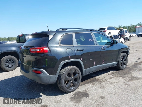 2016 Jeep Cherokee Latitude with VIN 1C4PJLCB6GW184264, listed as a IAAI auction lot 41783299 with 187,767 mi miles. Bid and sale history available at carsss.com. Image 4.