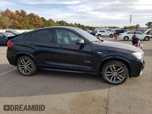 2016 BMW X4 xDrive28i with VIN 5UXXW3C55G0R22729, listed as a Copart auction lot 72906833 with 98,668 mi miles. Bid and sale history available at carsss.com. Image 4.