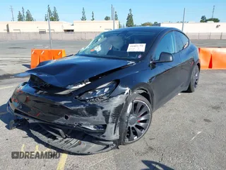 2022 Tesla Model Y Performance with VIN 7SAYGDEF5NF336693, listed as a IAAI auction lot 41805752 with 42,009 mi miles and . Bid and sale history available at DreamBid. Image 19.