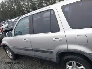 1999 Honda CR-V EX with VIN JHLRD1866XC033865, listed as a IAAI auction lot 41219896 with 142,396 mi miles. Bid and sale history available at carsss.com. Image 14.