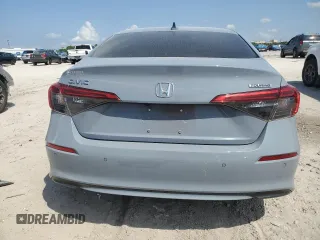 2022 Honda Civic Sedan Touring with VIN 2HGFE1F94NH302242, listed as a Copart auction lot 51201855 with 55,904 mi miles and Non Repairable. Bid and sale history available at carsss.com. Image 6.