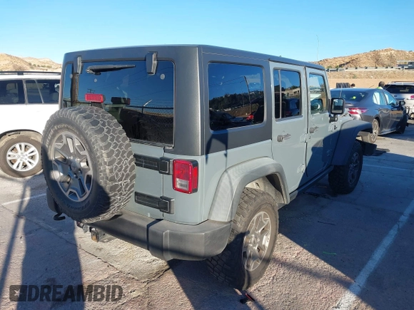 2014 Jeep Wrangler Unlimited Rubicon X with VIN 1C4BJWFG3EL134522, listed as a IAAI auction lot 41221381 with 66,897 mi miles and . Bid and sale history available at DreamBid. Image 4.