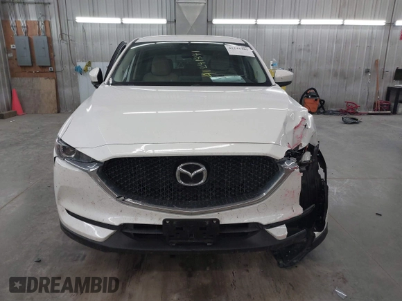 2017 Mazda CX-5 Touring with VIN JM3KFBCL9H0107589, listed as a IAAI auction lot 41241481 with 77,032 mi miles. Bid and sale history available at carsss.com. Image 12.