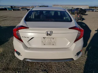 2019 Honda Civic Sedan LX with VIN 19XFC2F6XKE200211, listed as a Copart auction lot 86873424 with 87,397 mi miles and Salvage Title. Bid and sale history available at carsss.com. Image 6.