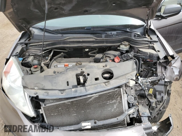 2011 Honda CR-V LX z VIN 5J6RE4H33BL083594, wystawiony jako Copart lot #50398955 z przebiegiem 173 634 mil mil oraz Szkoda całkowita • Salvage title. Historia ofert i sprzedaży dostępna na DreamBid. Obrazek 13.