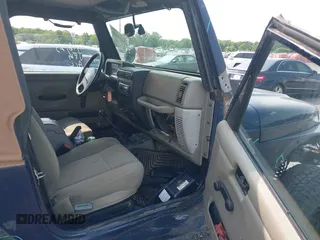 2006 Jeep Wrangler Sport z VIN 1J4FA49S66P708332, wystawiony jako IAAI lot #42402995 z przebiegiem 130 795 mil mil oraz . Historia ofert i sprzedaży dostępna na DreamBid. Obrazek 5.