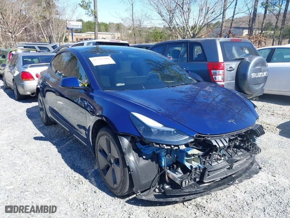 2023 Tesla Model 3 with VIN 5YJ3E1EA8PF671465, listed as a IAAI auction lot 41599200 with 21,859 mi miles. Bid and sale history available at carsss.com. Image 1.